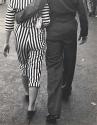 Untitled [Couple Walking], Vintage silver print, ca. 1950.